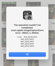 Error dialog from Apple's Image Capture application, saying "The operation couldn't be completed (com.apple.ImageCaptureCore error -9934.)" and listing five random movies.